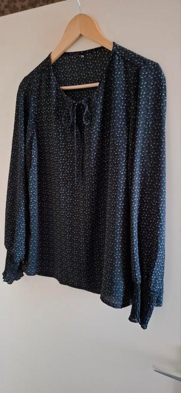 Zwarte blouse met print beschikbaar voor biedingen