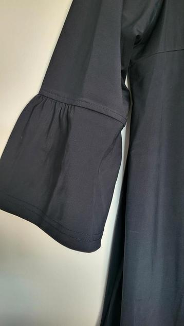 Travelstof jurk beschikbaar voor biedingen