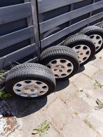 Goodyear winterbanden met stalen velgen en wieldoppen., Ophalen, Gebruikt