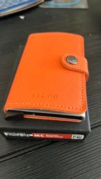 Secrid wallet limited nieuw, Sieraden, Tassen en Uiterlijk, Ophalen of Verzenden, Zo goed als nieuw, Oranje