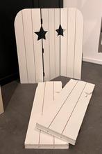 Houten drieluik met sterren, Ophalen, Gebruikt