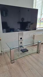 Modern TV meubel van glas en geborsteld RVS., Ophalen, Gebruikt, 50 tot 100 cm, Glas