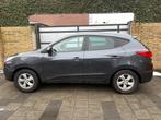 Hyundai Ix35 2.0i Dynamic, Auto's, Hyundai, Gebruikt, Zwart, 4 cilinders, Leder en Stof