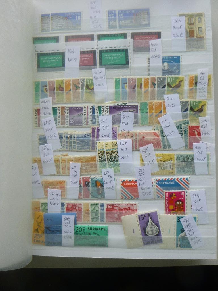 Dik stockboek propvol Nederlandse Kolonieen Suriname etc, Postzegels en Munten, Postzegels | Volle albums en Verzamelingen, Ophalen of Verzenden