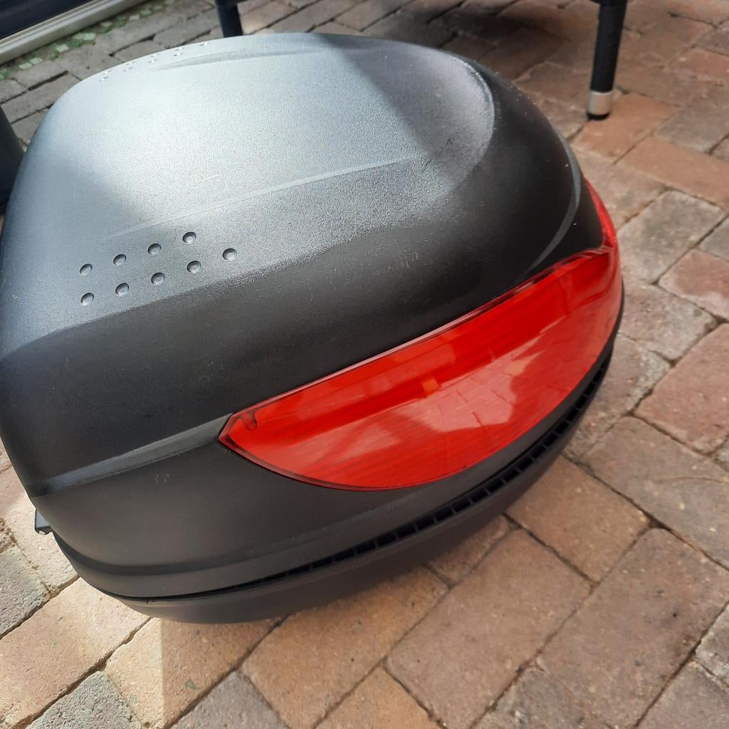 Scooter topkoffer Moto-Box, Ophalen