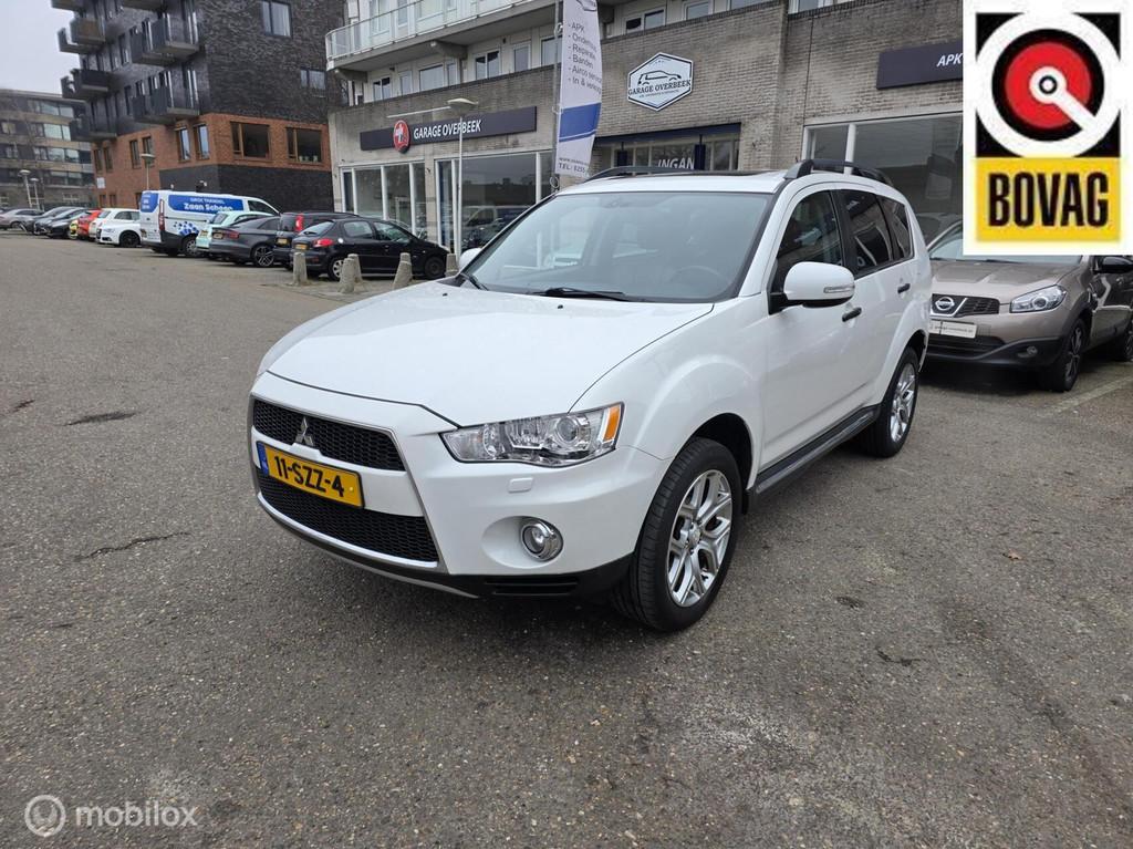 Mitsubishi Outlander 2.4 2012 AUT/7PERS/LEDER/TRKHAAK/DAKJE!, Auto's, Mitsubishi, Automaat, 4 cilinders, 7 stoelen, Wit