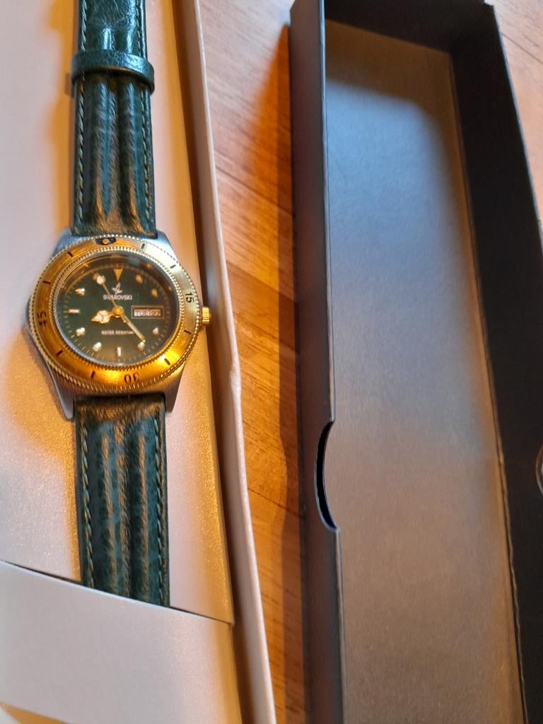 Swarovski horloge met groen leren bandje, Ophalen of Verzenden, Nieuw, Leer, Overige merken
