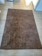Donkerbruine vloerkleed, Ophalen of Verzenden, Zo goed als nieuw, Rechthoekig, 100 tot 150 cm