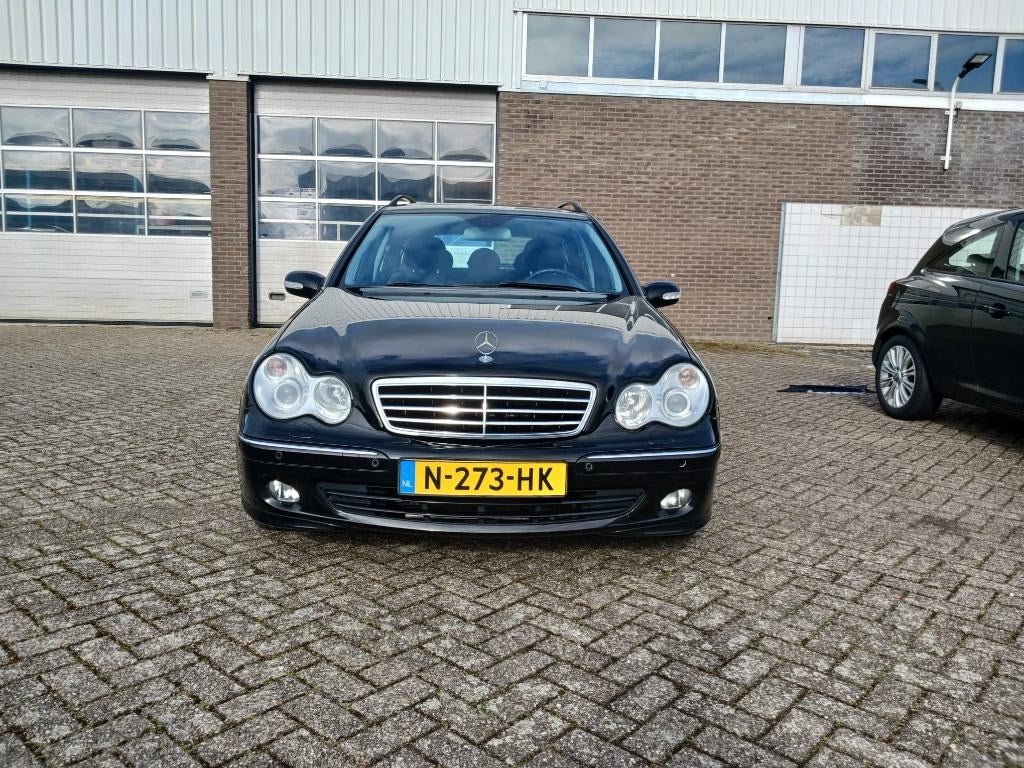Mercedes-Benz C-Klasse 2.5 C230 Combi AUT 2006 Zwart, Auto's, Mercedes-Benz, Automatische klimaatregeling, Zwart, 2497 cc, 2000 kg