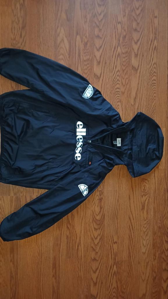 Ellesse Zwarte Windbreaker met Capuchon, Ophalen of Verzenden, Zo goed als nieuw