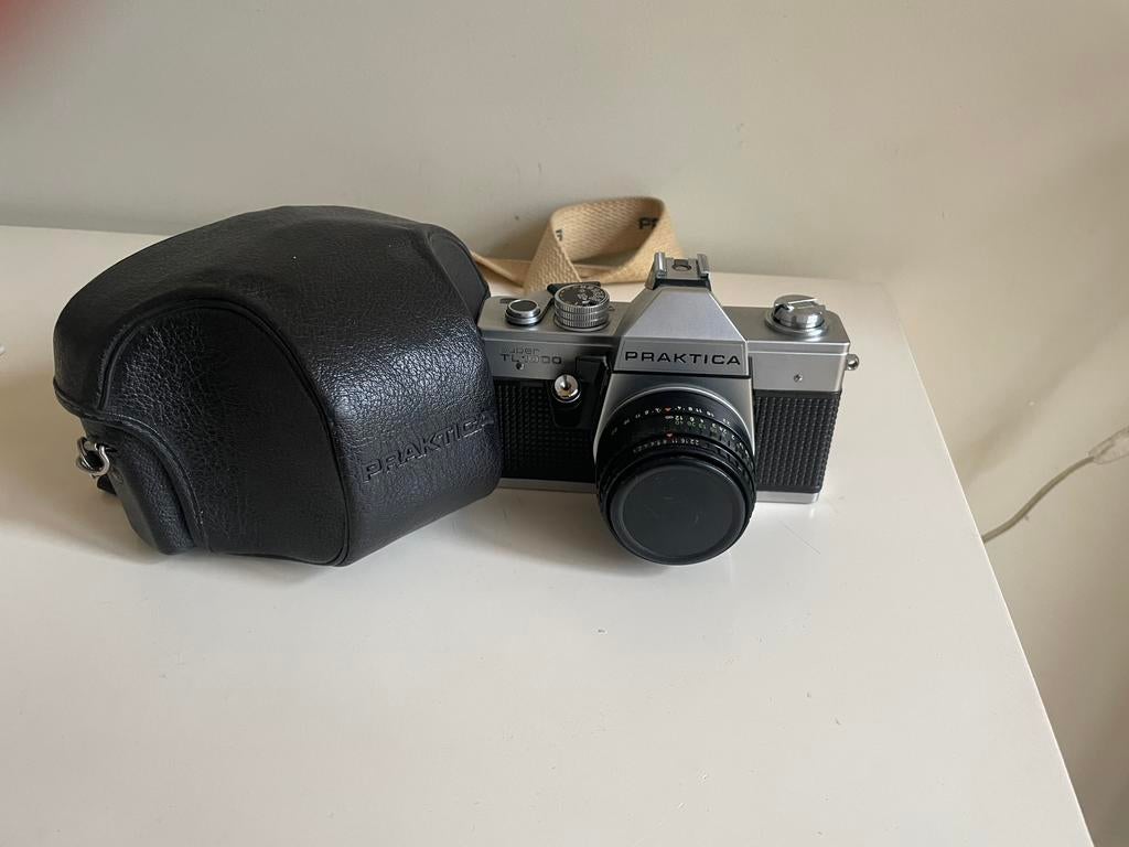 Praktica Super TL 1000 - 35mm Spiegelreflexcamera + 3 lenzen, Audio, Tv en Foto, Fotocamera's Analoog, Ophalen of Verzenden, Gebruikt