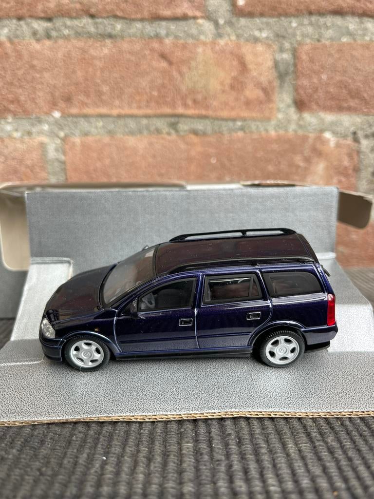 1:43 Schuco Opel Astra caravan, Ophalen of Verzenden, Zo goed als nieuw, Auto, Schuco