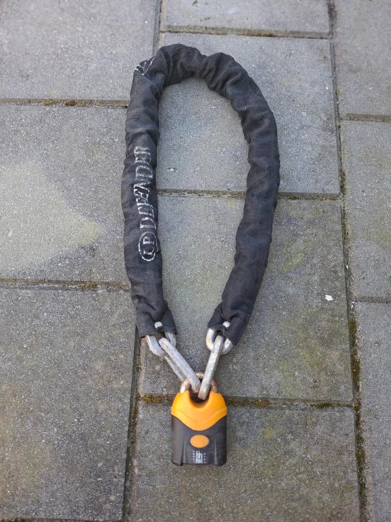 Defender motor of scooter kettingslot, Ophalen