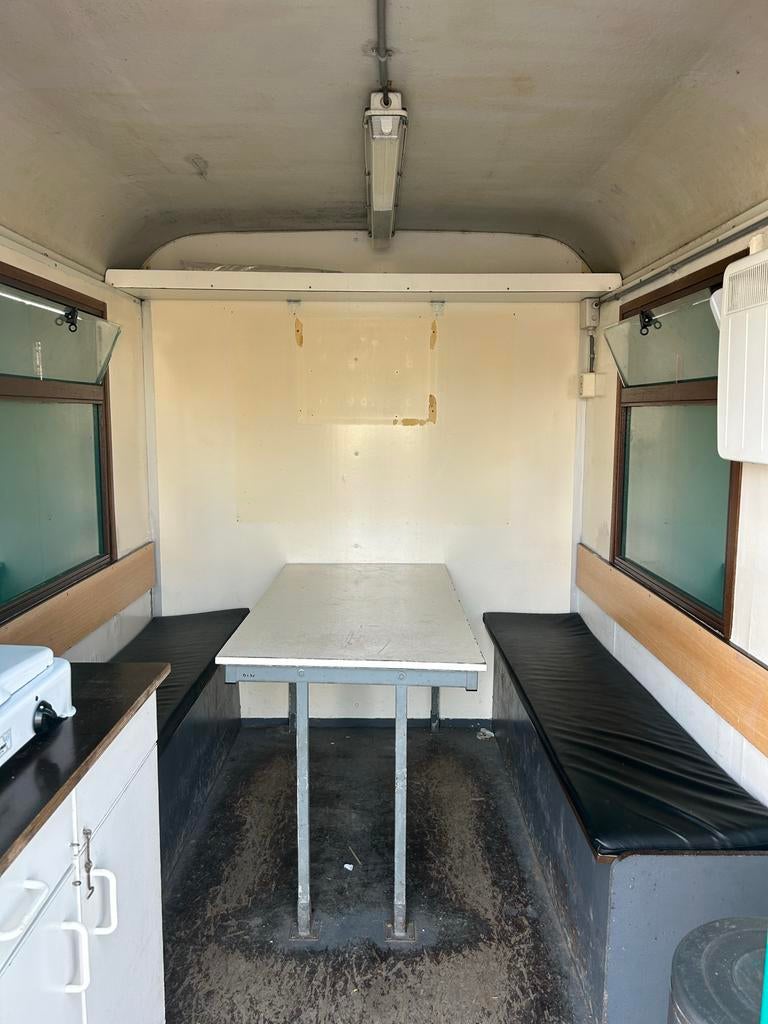 Schaftwagen tandemas snelverkeer met toilet en berging, Ophalen
