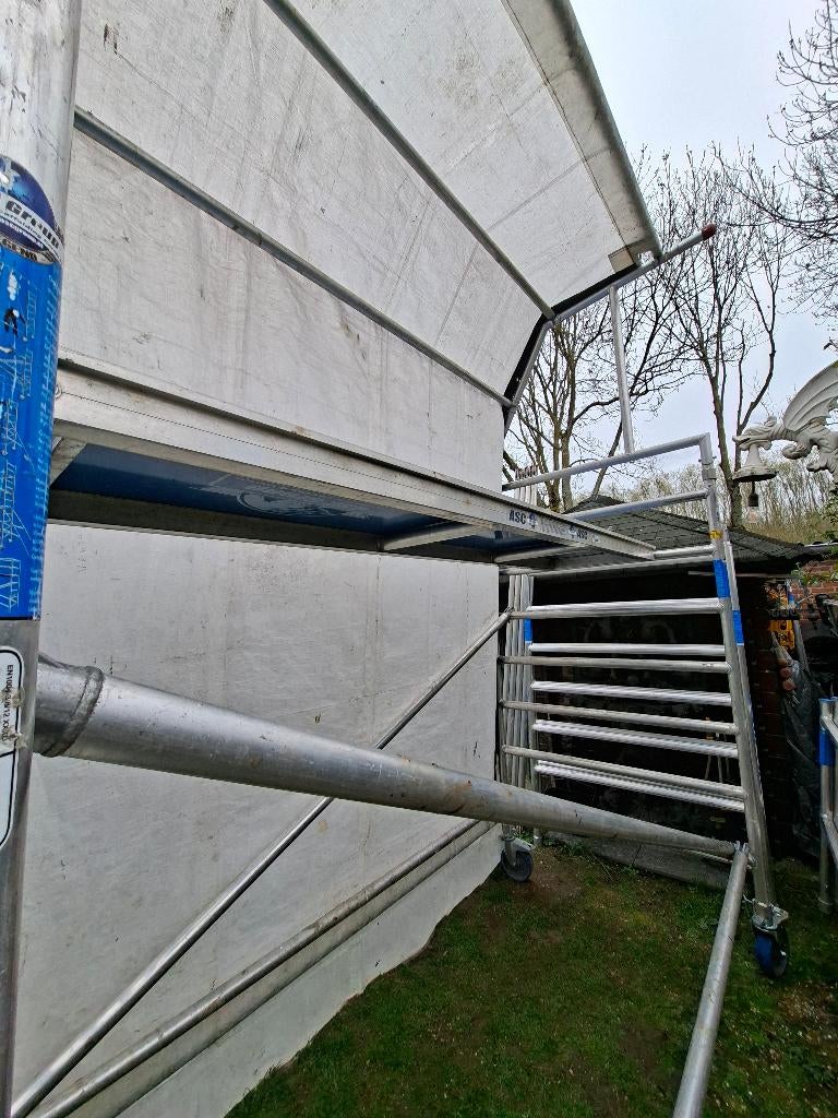 steiger ASC--Met doorwerktent-- werkhoogte ca.14 meter---, Ophalen of Verzenden, Zo goed als nieuw, Rolsteiger of Kamersteiger