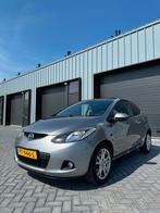 Mazda 2 1.3 63KW 3DRS 2009 Grijs, Voorwielaandrijving, Stof, 4 cilinders, Stoelverwarming