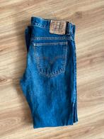 Donkerblauwe Levi’s 602 maat 33, Ophalen of Verzenden, Gedragen, Blauw