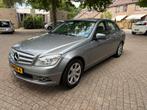 Mercedes-Benz C-Klasse 1.6 C180 Kompr. Sedan AUT 2009 Grijs, Auto's, Mercedes-Benz, Automaat, 745 kg, Achterwielaandrijving, Leder en Stof