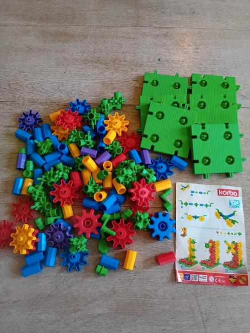 Korbo speelgoed bouwstenen inclusief boekje, Kinderen en Baby's, Speelgoed | Bouwstenen, Zo goed als nieuw, Overige merken, Ophalen of Verzenden