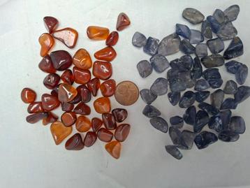 Oranje en blauwe saffier beschikbaar voor biedingen