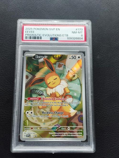 Eevee Holo Pokemon kaart Prismatic Evolutions PSA8 promo, Hobby en Vrije tijd, Verzamelkaartspellen | Pokémon, Zo goed als nieuw