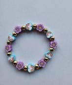 nieuwe armband met bloemetjes en regenbogen, Ophalen of Verzenden, Nieuw, Armband