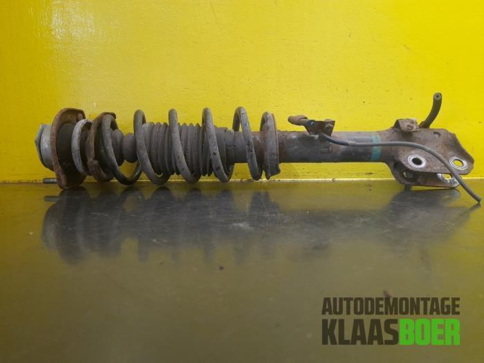 Schokdemperpoot rechts-voor van een Daihatsu Cuore, Auto-onderdelen, Ophanging en Onderstel, Daihatsu, Gebruikt, 6 maanden garantie