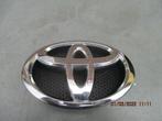 Embleem voorbumper toyota auris E 18, Auto-onderdelen, Ophalen of Verzenden, Nieuw, Toyota