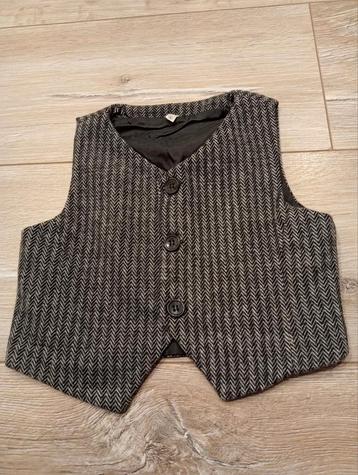 Mooi grijs/ zwart gilet maat 80. beschikbaar voor biedingen