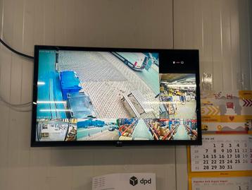 LG 24" TV met muurbeugel en afstandsbediening beschikbaar voor biedingen