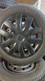 Suzuki Swift stalen 15" velgen met seizoen banden, Ophalen, Gebruikt, 15 inch, Banden en Velgen