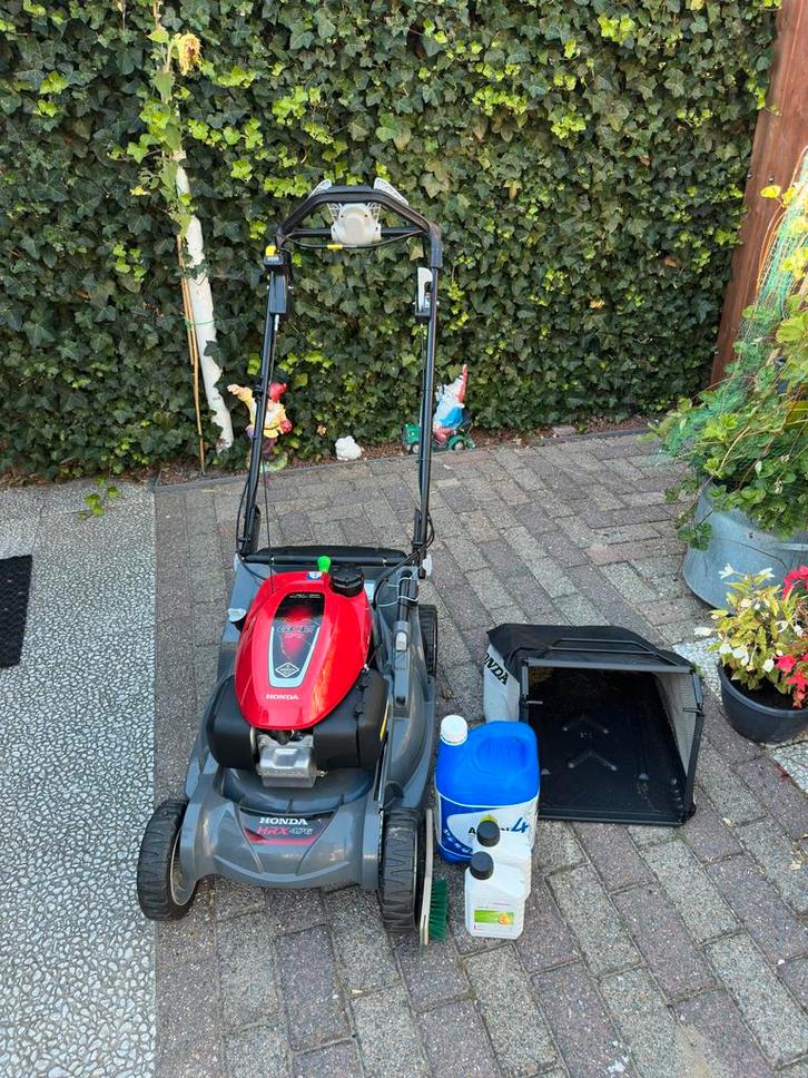 Honda hrx476 VY rotorstop en messkoppeling ingeboude mulch, Tuin en Terras, Grasmaaiers, Zo goed als nieuw, Benzine-grasmaaier