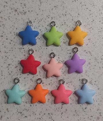 Gekleurde sterretjes bedels "nieuw" beschikbaar voor biedingen