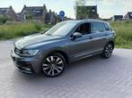 Volkswagen Tiguan R-Line 2.0 TSI 220pk 4Motion DSG, Auto's, Volkswagen, 4 cilinders, 1984 cc, 2500 kg, Leder