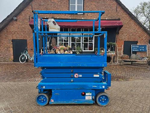 Skyjack 3219 schaarlift hoogwerker 8m 2015 goede accu's, Zakelijke goederen, Machines en Bouw | Liften, Steigers en Ladders