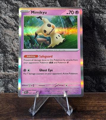 Mimikyu Holo 037/091 Paldean Fates beschikbaar voor biedingen