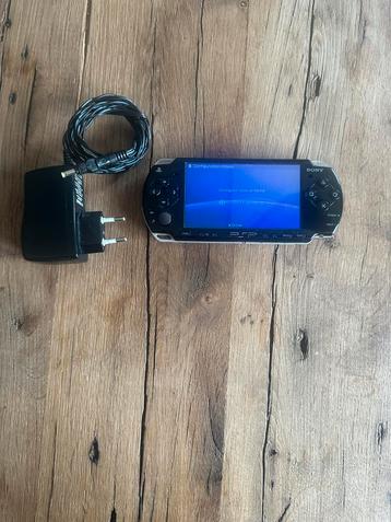 Deels Defecte Sony PSP met lader en batterij beschikbaar voor biedingen