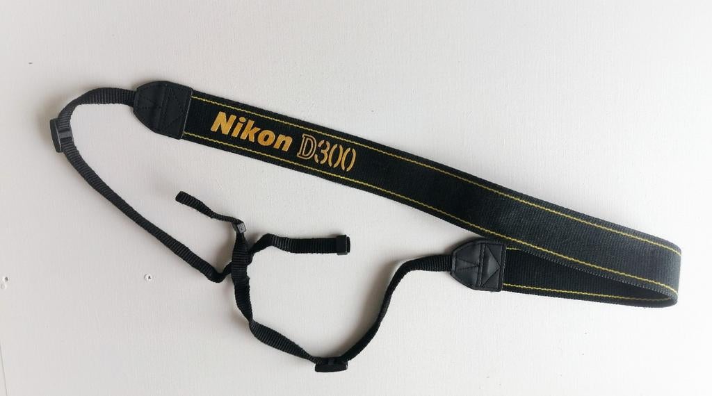 Draagriem Nikon D300  € 5,00, Ophalen of Verzenden, Gebruikt, Overige typen, Overige merken