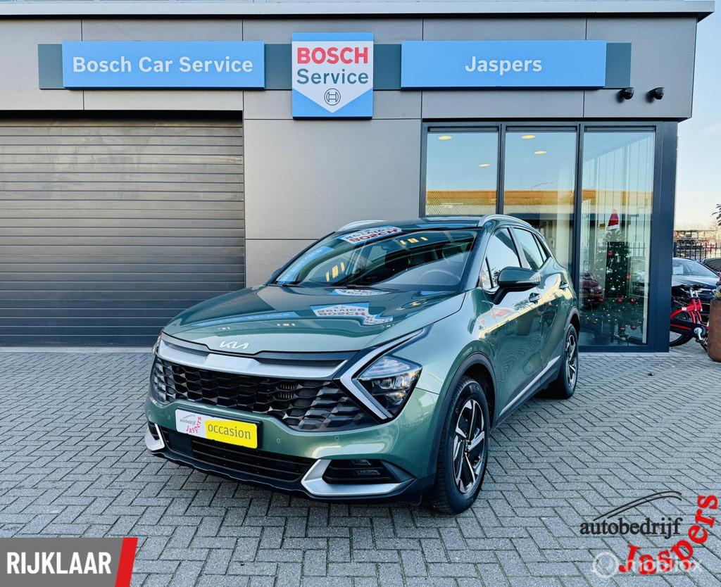 Kia Sportage 1.6 T-GDi Hybrid DynamicLine, Auto's, 12 maanden, Stof, Gebruikt, Zwart