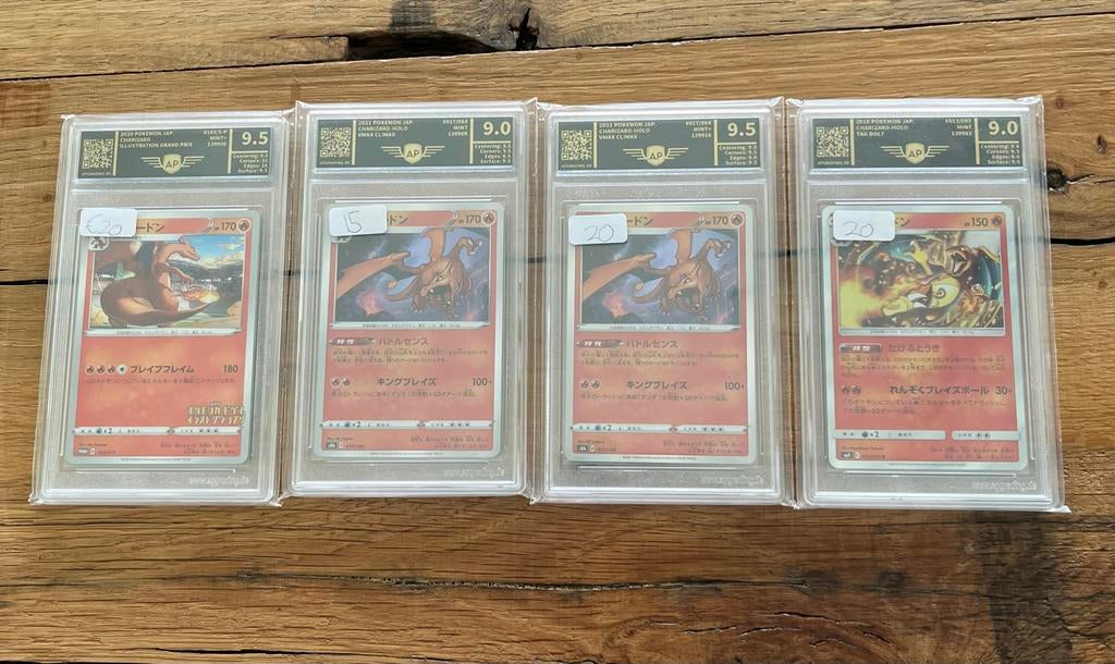 4 graded Charizard kaarten, Ophalen of Verzenden, Zo goed als nieuw, Meerdere kaarten