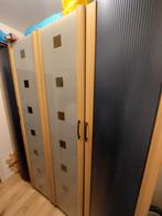 Grote hang- en legkast met blauwe en glazen deuren, Ophalen