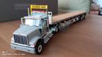 INTERNATIONAL HX520 MET 2AS FLATBED TRAILER, Ophalen of Verzenden, Nieuw, Bus of Vrachtwagen, Wsi