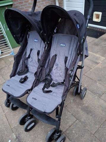 Tweeling buggy merk Chicco model echo kleur zwart grijs  beschikbaar voor biedingen