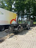 Haakarm Containersysteem achter trekker of verreiker, Ophalen