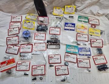 Partij Kyosho onderdelen GXR, Fazer, V One, Fw05, FW06, R246 beschikbaar voor biedingen