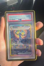 Pokemon - 2025 Umbreon 161/131 PSA 10 Prismatic Evolutions, Hobby en Vrije tijd, Verzamelkaartspellen | Pokémon, Ophalen of Verzenden