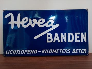 Origineel emaille reclamebord Hevea Banden beschikbaar voor biedingen