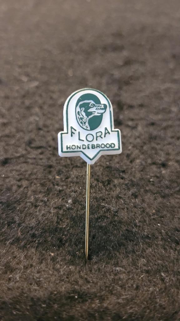 Flora hondenvoedsel Dordrecht speldje, Verzamelen, Speldjes, Pins en Buttons, Zo goed als nieuw, Speldje of Pin, Dier of Natuur
