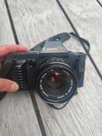 Canon T70 analoge spiegelreflex camera met extra lenzen, Ophalen of Verzenden, 8mm, Camera