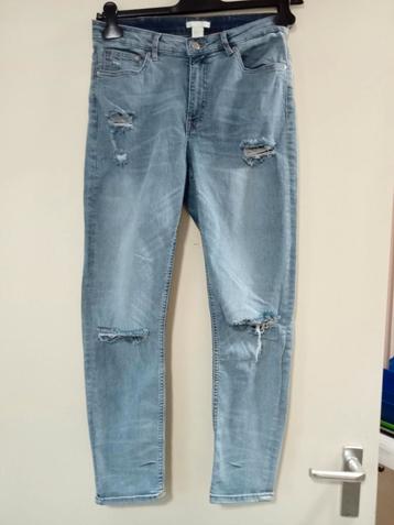 Hippe ripped stretch jeans, maat 40, vage verkleuringen beschikbaar voor biedingen